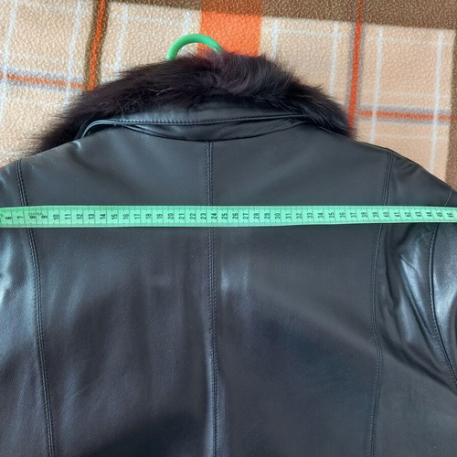 Women's leather jacket black like new, size large with fur collar