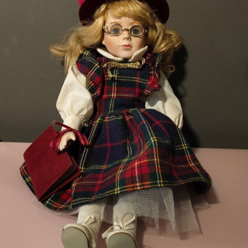 Porcelain doll used in music teacher role