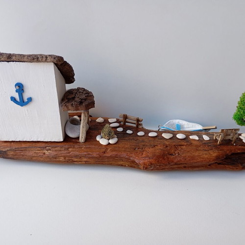 Handmade sea-themed driftwood diorama with Greek island house