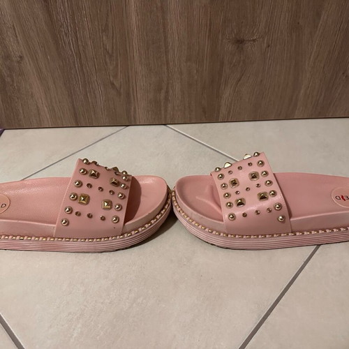 Keep Fred pink soft slippers like new with gold studs