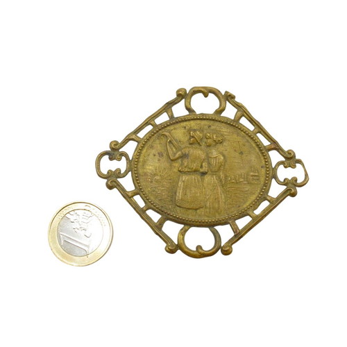 Antique brass decorative ornament with loving couple, like new