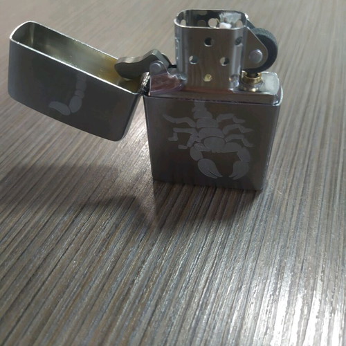 Zippo Scorpion lighter new with case and gift stones