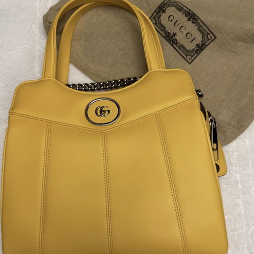 Gucci handbag new, yellow with long strap