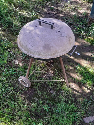 Charcoal grill used with wheels