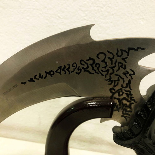 Decorative stainless steel knife with stand like new