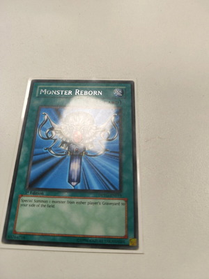 Monster Reborn Yu-Gi-Oh card like new, authentic
