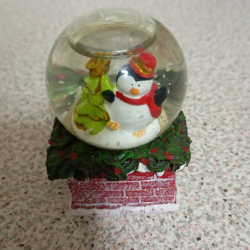 Glass decorative ball like new with artificial snow Christmas