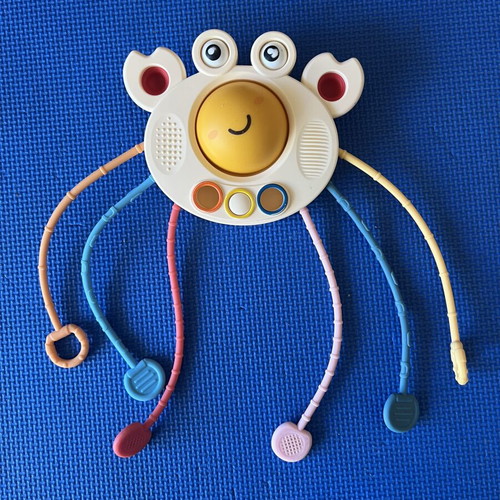 Montessori Pull String Toy for Baby used, sensory development
