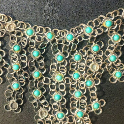 Vintage necklace used with turquoise stones and plated metal