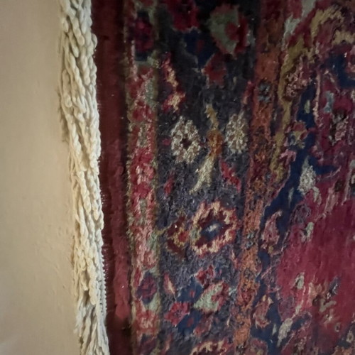 Handmade rug like new with traditional beaded element