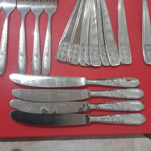 Cutlery set 24 pieces like new with coasters and opener