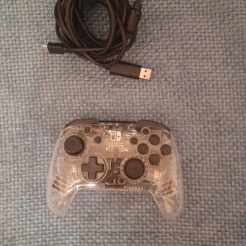 Nintendo Switch console with controller, Mario Kart Deluxe 8 code