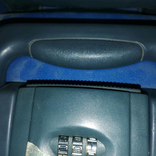Hard plastic suitcase with lock and wheels