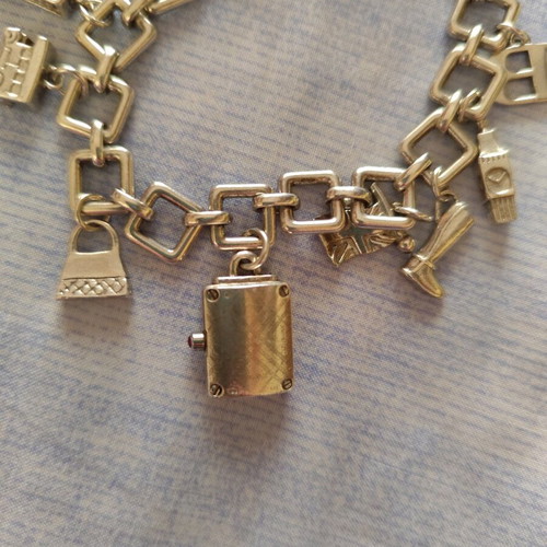 Burberry charm watch bracelet like new, silver plated finish