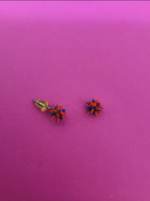 Urchin earrings like new, hypoallergenic steel with blue and red silicone