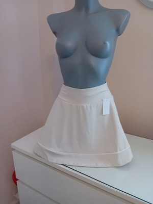 Athletic skirt with shorts underneath, beige, size M