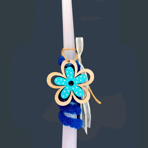 Easter candle with wooden blue flower and bag