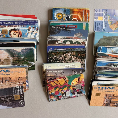 Collection of 133 used phone cards in good condition