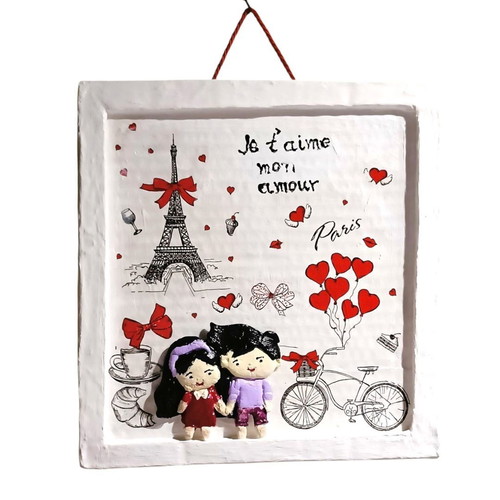 Handmade Saint Valentine frame with loving couple in Paris, new
