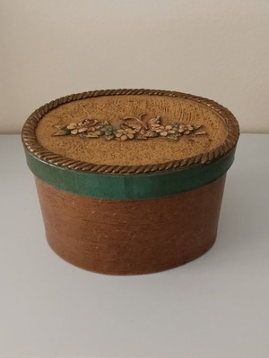 Vintage oval decorative storage box with embossed lid