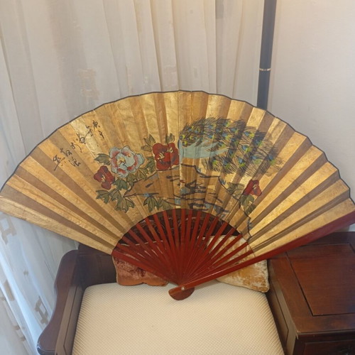 Large decorative Asian art wall fan with peacock feathers and peonies, vintage