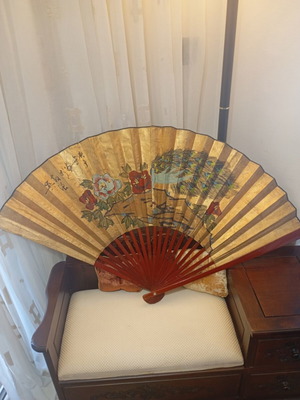 Large decorative Asian art wall fan with peacock feathers and peonies, vintage