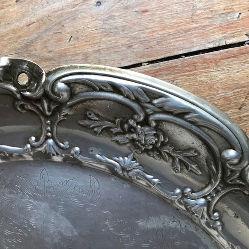 Silver-plated round disc used with age damage