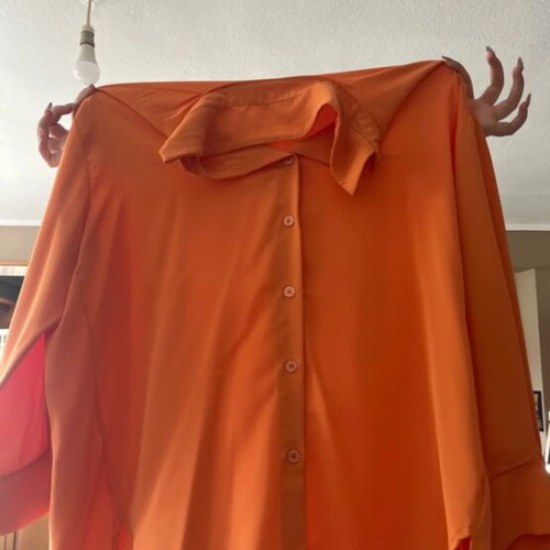 Women's orange shirt like new, size large - extra large