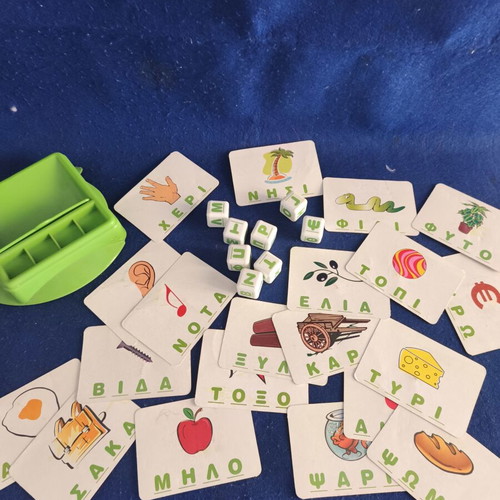Educational game used for first words and syllables with alphabet cubes