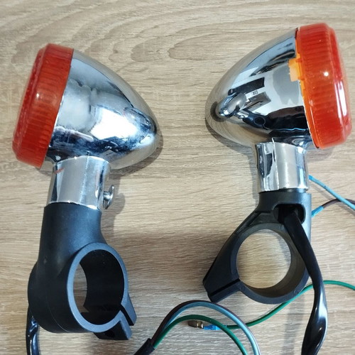 Motorcycle turn signals new with chrome base and orange cover