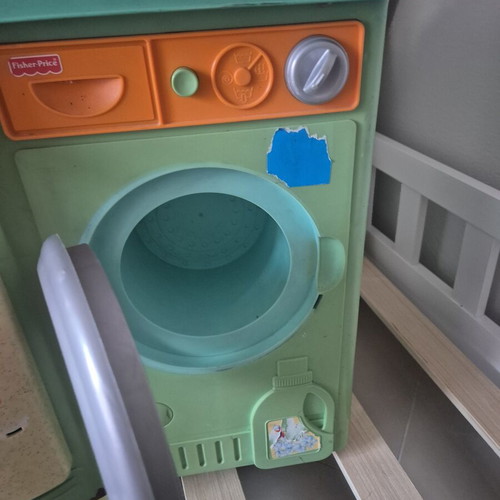Fisher Price children's play kitchen with microwave and washing machine