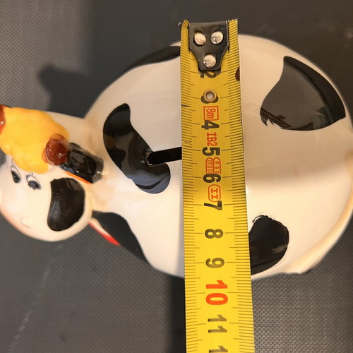 Ceramic Cow Piggy Bank like new, decorative and cute