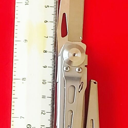 Multitool new with large scissors, knife, and double-tip screwdriver