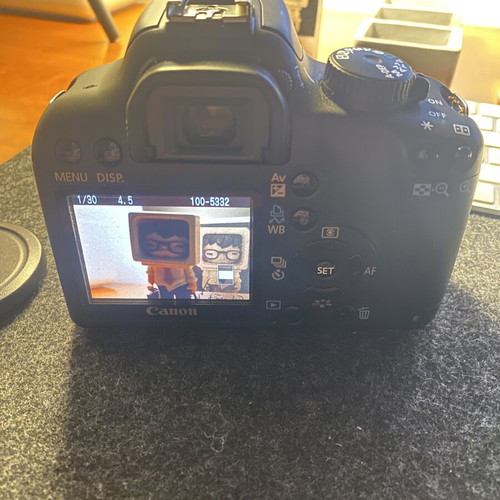 Canon EOS 1000D DSLR with EF-S 18-55mm IS lens, used