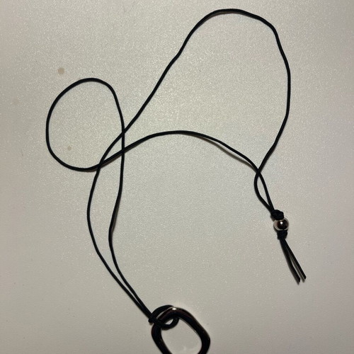 Necklace new silver with black cord