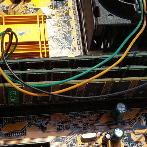 Vindage motherboard with Celeron processor and 3 memories