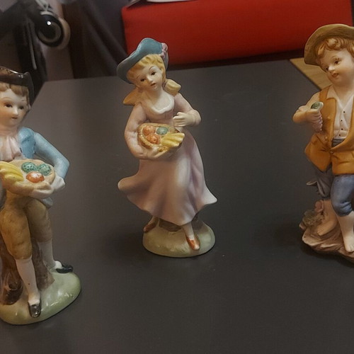 Porcelain figurines vintage set of 3 like new
