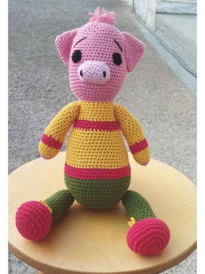 Handmade amigurumi pig crochet toy