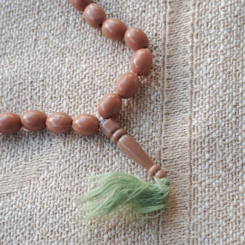 Komboloi with 35 beads like new, plastic, green tassel