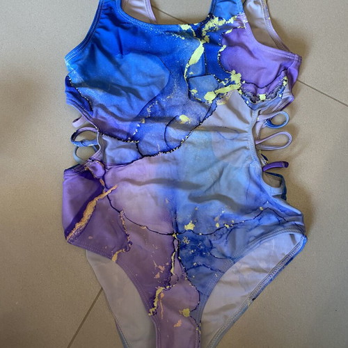 Girls' swimsuits like new, pack of 4, ages 7-9
