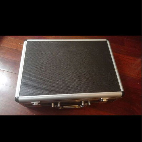 Small suitcase used, black and white, dimensions 35x25x10 cm