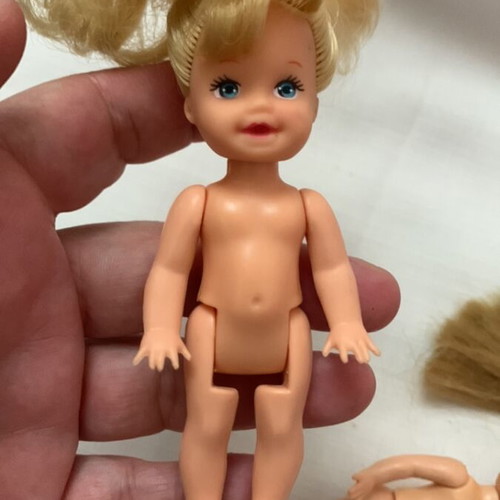 Small dolls like new with soft hair