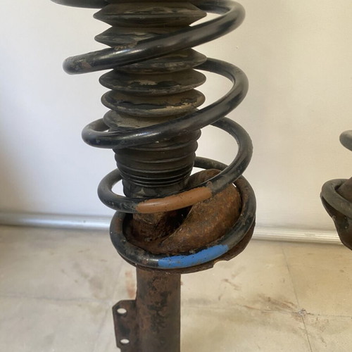 Ford Escort front shock absorbers complete with springs and mounts used
