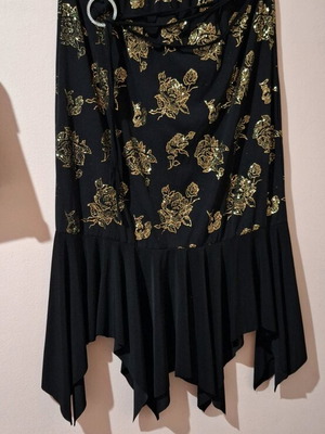 Elastic skirt with gold details like new, black