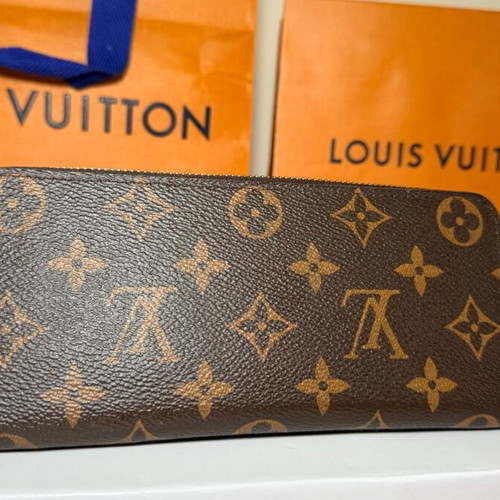 Louis Vuitton Clémence wallet used, monogram canvas with pink zipper