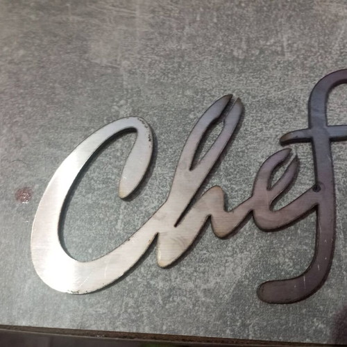 Metal Chef sign