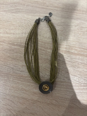 Handmade olive multi-strand necklace with metal decorative element