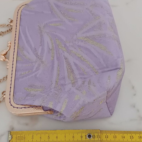 Vintage shoulder bag new in purple and gold shades with floral lining