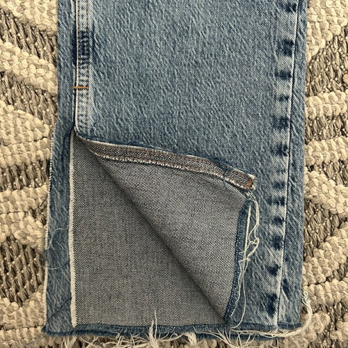 Zara women's jeans new, light blue with rips and frayed hems, size 34