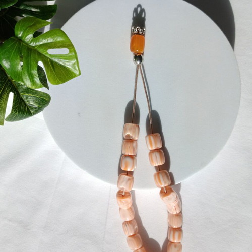 Komboloi with peach-orange cubic beads like new